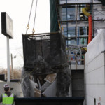 Cranetainer dumping from a crane