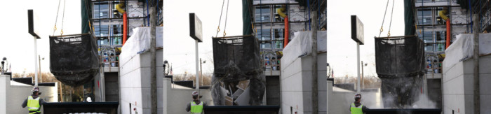 Cranetainer dumping from a crane